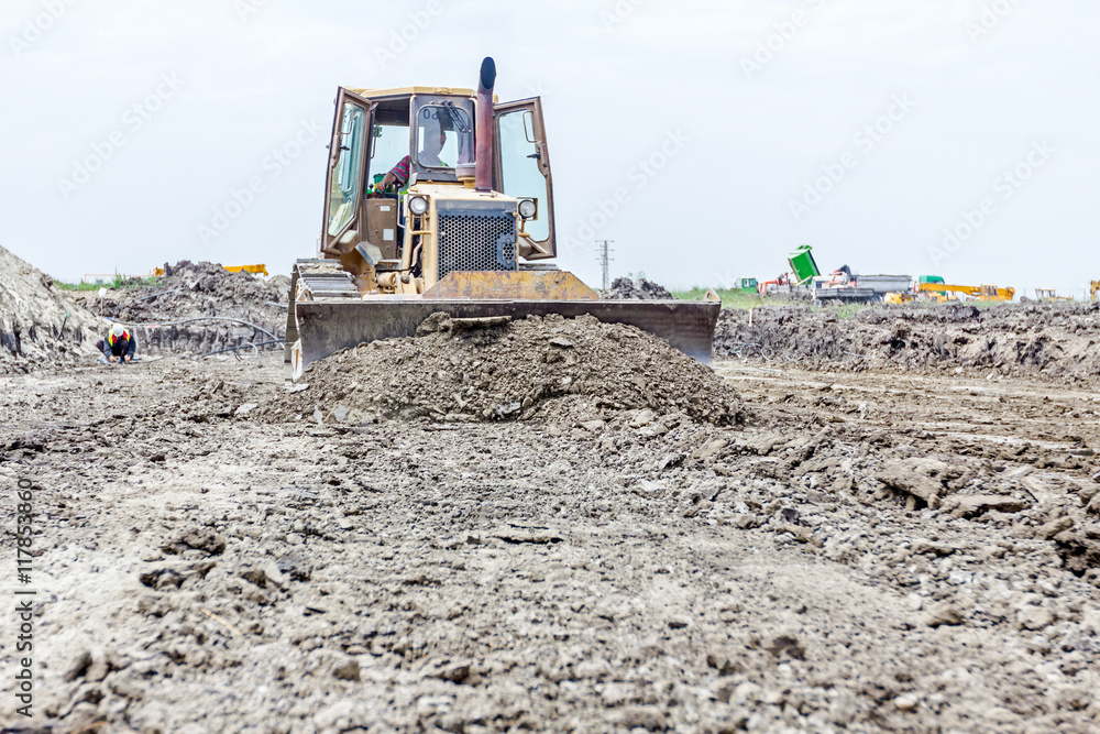 Fototapeta premium Front side of heavy earthmover construction machine in action