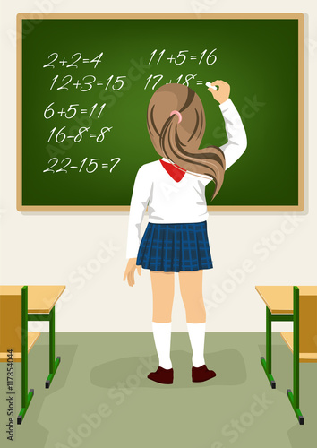 Back view of schoolgirl solving arithmetical on blackboard