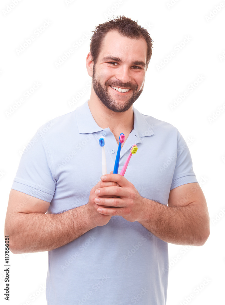 Happy man with toothbrushes Happy man with toothbrushes