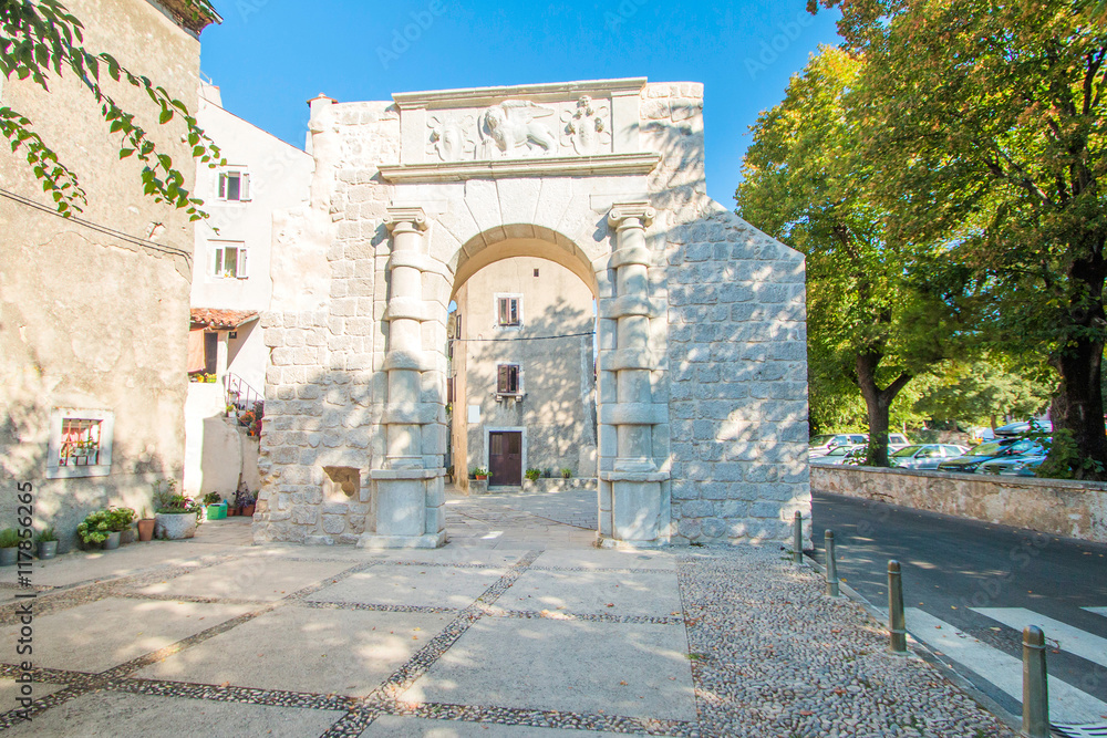 Fototapeta premium Old gates and street in the old town of Cres, Croatia, Mediterranean ambient 