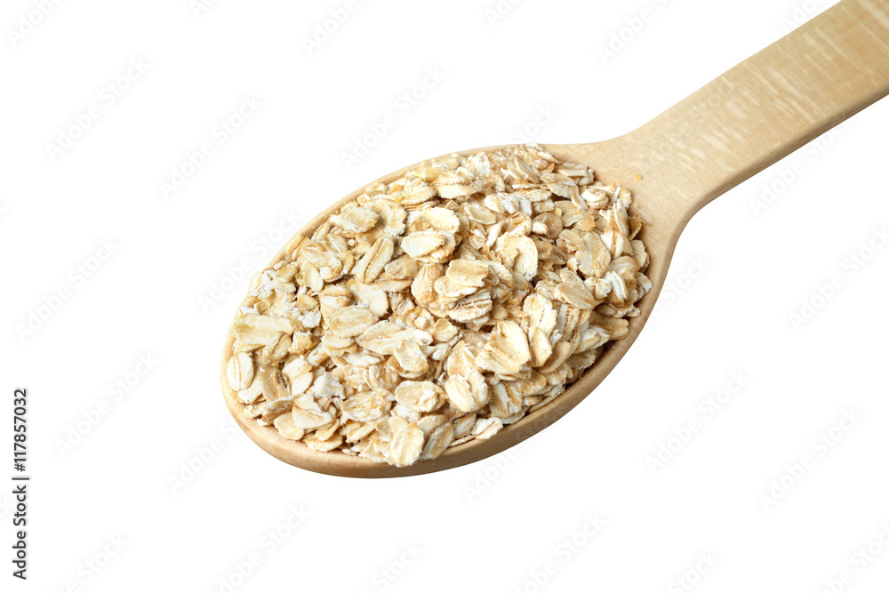 Rolled oats in a wooden spoon Rolled oats in a wooden spoon