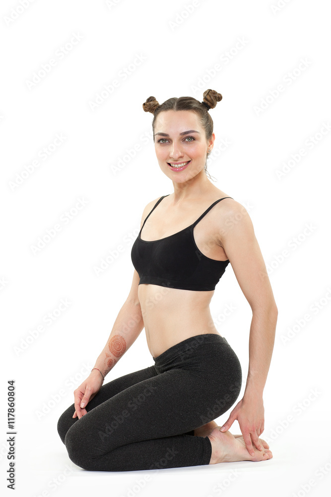 Young brunette woman doing pilates exercises isolated Young brunette woman doing pilates exercises isolated