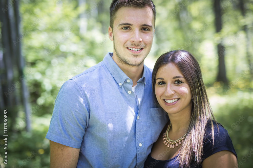 Happy loving young couple at the park Happy loving young couple at the park