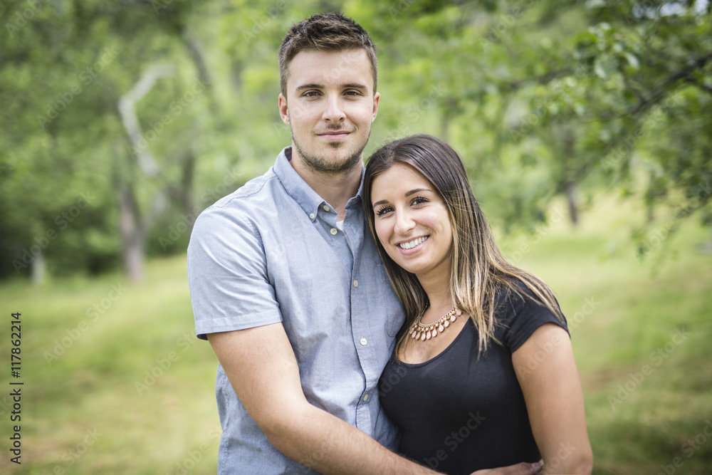 Happy loving young couple at the park Happy loving young couple at the park