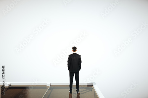 Man looking at grey sky