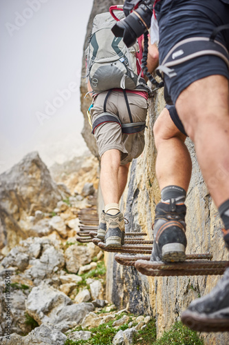 stairway to heaven / mountaineering on ellmauer halt in Austria photo