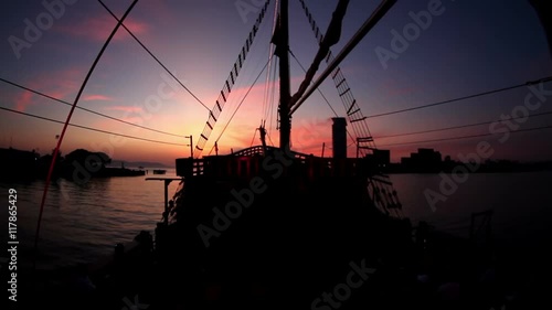 old wooden pirate ship out at sea