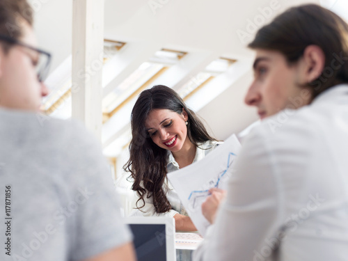 portrait of young business woman at modern startup office interi