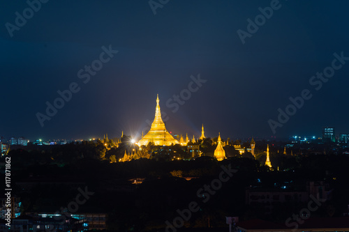 Night view of Shwedagon Pagoda, Yangon, Myanmar.  soft focus with grain.  © vividec