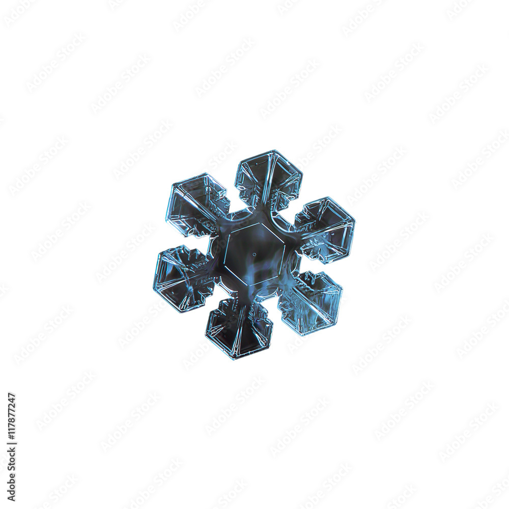 Snowflake isolated on white background. This is macro photo of real snow crystal with short, broad arms, excellent symmetry, and simple pattern inside of central hexagon. Snowflake isolated on white background. This is macro photo of real snow crystal with short, broad arms, excellent symmetry, and simple pattern inside of central hexagon.