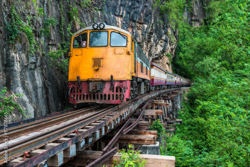 Train into the Railway bridge at Kanchanaburi © tumeyes