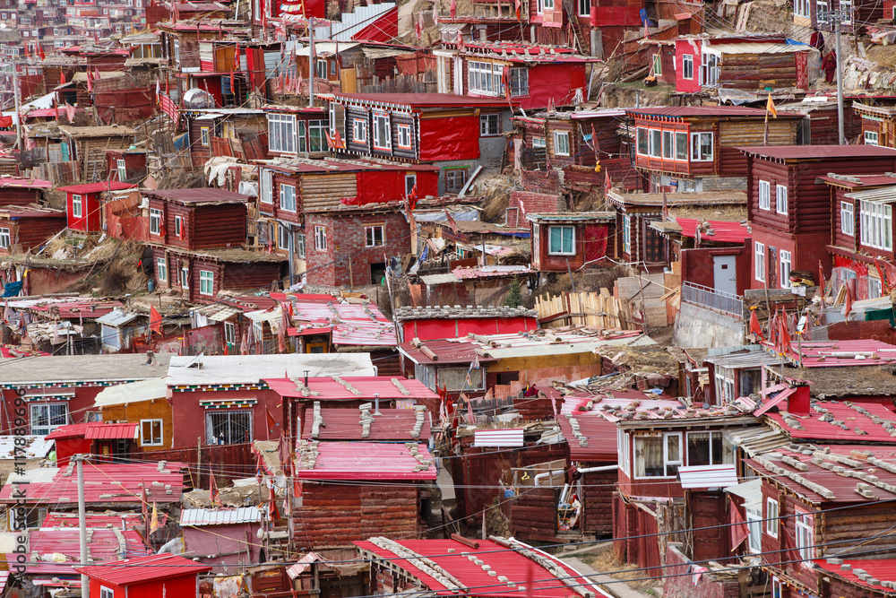 Red monastery at Larung gar (Buddhist Academy) in sunshine day, Sichuan, China