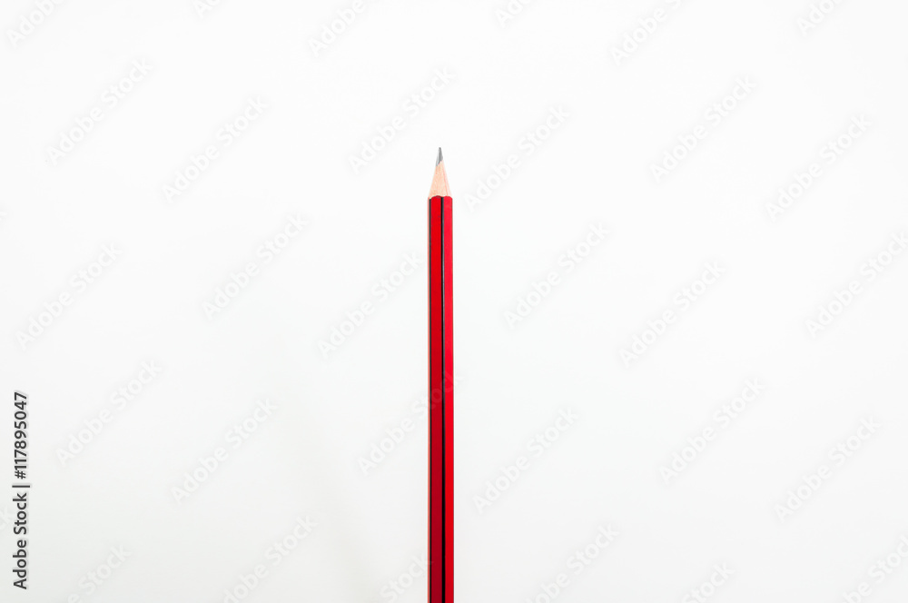 Red pencil on white background Red pencil on white background