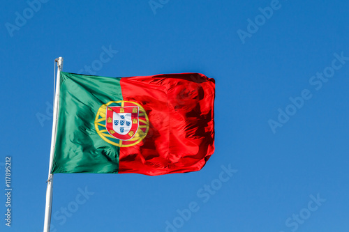 Portugal Flag on Blue Sky Background