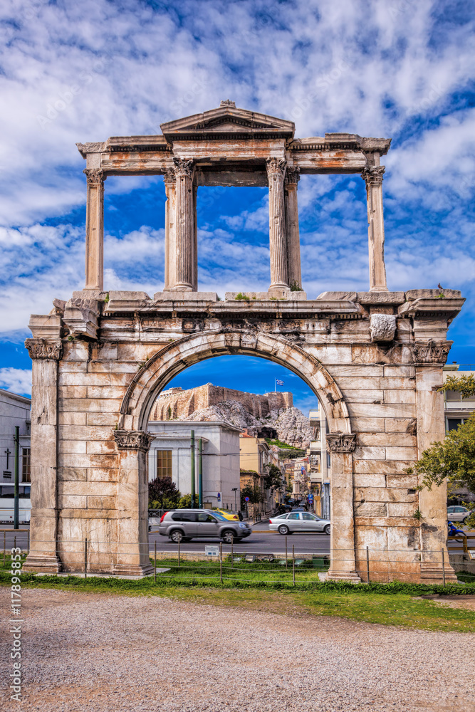 Arch of Hadrian against Parthenon temple on the Acropolis in Athens, Greece