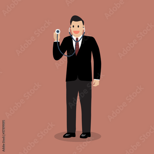 Businessman holding stethoscope