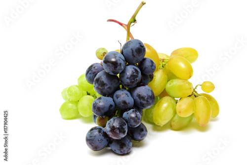 Blue and green wet grapes bunch isolated on white background