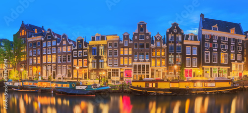 Photography Amstel river, canals and night view of beautiful Amsterdam city