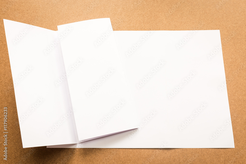White paper note on business wood desk with copy space. White paper note on business wood desk with copy space.