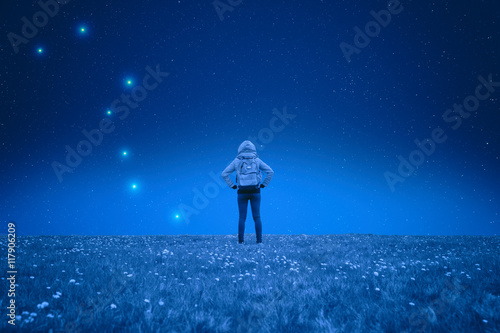 Girl watching the stars.  photo