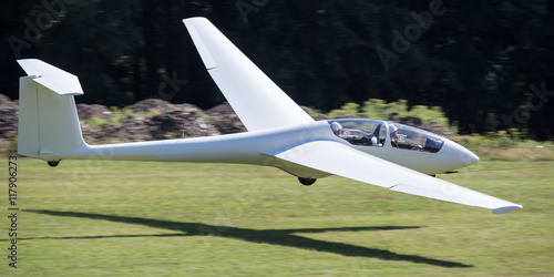 sailplane with towing rope starting on an airfield