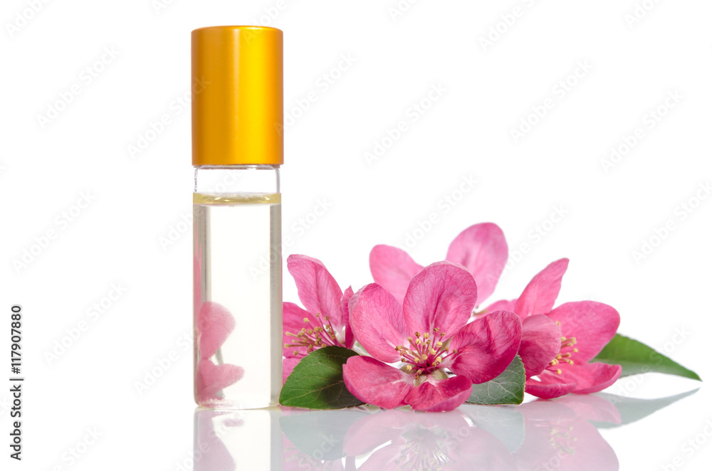 Face cream bottle with flowers isolated on white Face cream bottle with flowers isolated on white