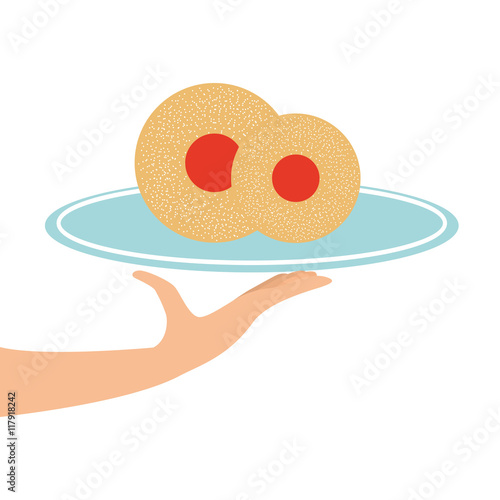hand holding a tray of dessert