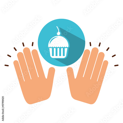 two hands holding cupcake