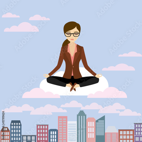 Business woman is meditating and relaxing in lotus pose,