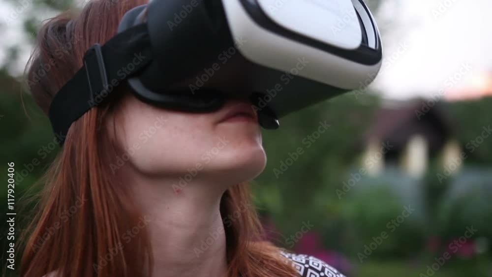 Young woman in 360 VR glasses. Virtual reality glasses. Young woman in 360 VR glasses. Virtual reality glasses.