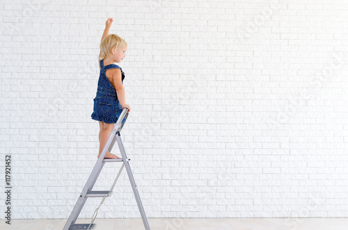 Girl on the ladder