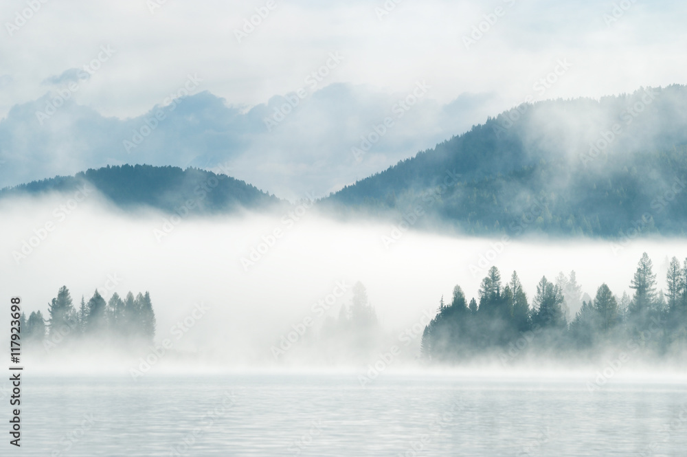 Heavy fog in the early morning on a mountain lake
Early morning on Yazevoe lake in Altai mountains, Kazakhstan 