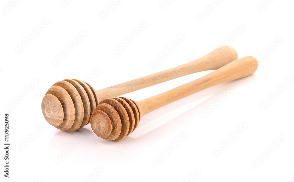 Wooden Spoon honey on white background