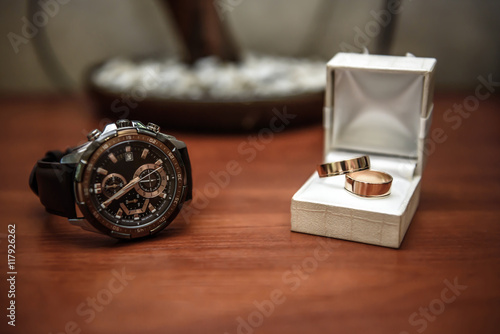 wedding ring in a box and watch the groom