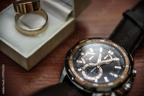 wedding ring in a box and watch the groom