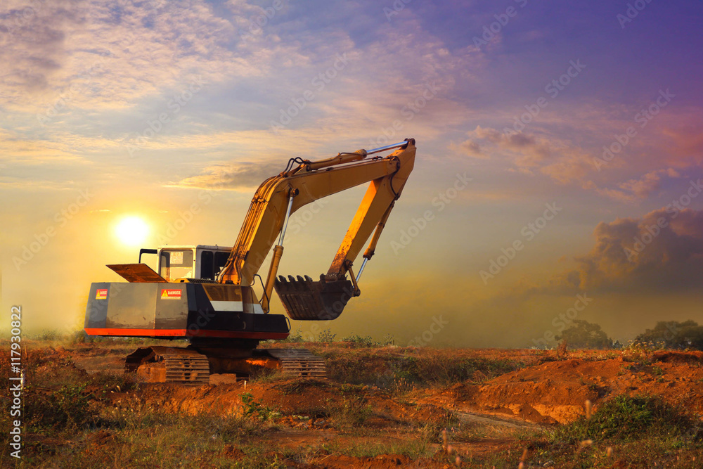 Excavator working and moving earth in construction afternoon Excavator working and moving earth in construction afternoon