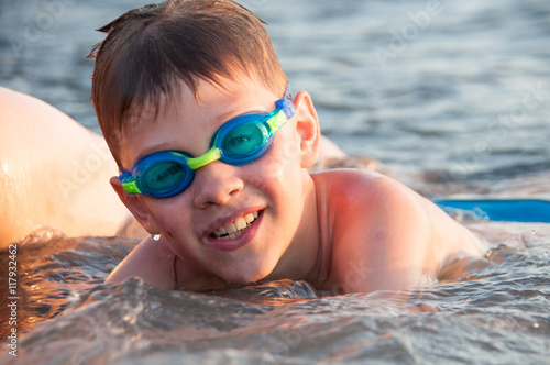 Boy bathing in the sea