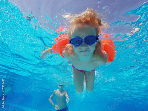 child swim in the pool © Photobank