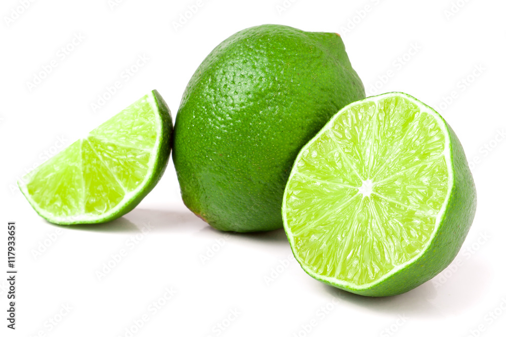 lime with slices and half isolated on white background