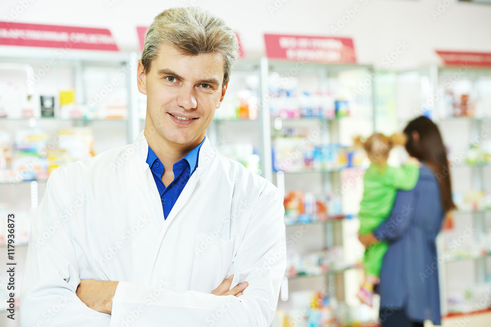 Confident pharmacy chemist man in drugstore