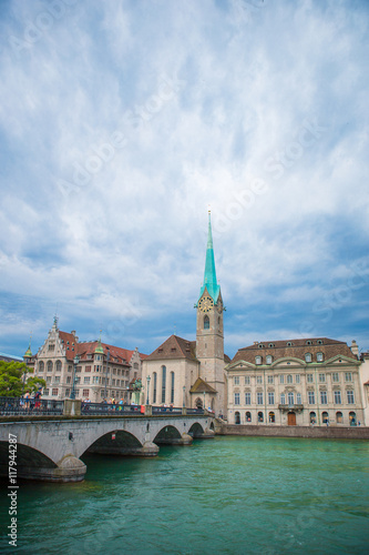 View of the historic city center of Zurich with famous Fraumunster Church and river Limmat, Switzerland © travnikovstudio