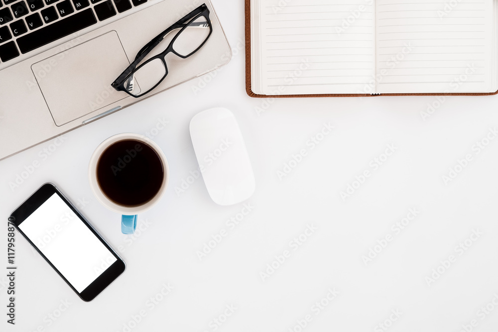 White office workspace with blank screen smartphone, eyeglasses, mouse, laptop, leather notebook and cup of coffee.  Top view with copy space - obrazy, fototapety, plakaty 
