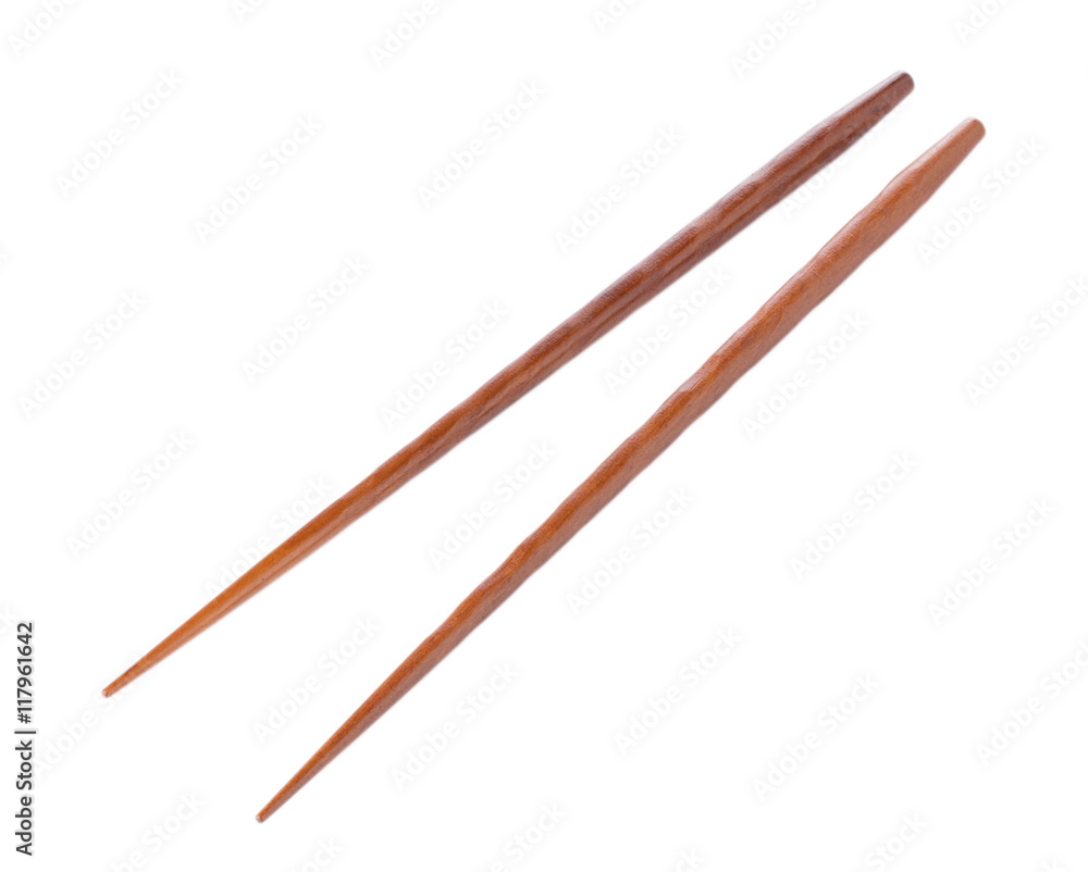 Wooden pairs of chopsticks on white background Wooden pairs of chopsticks on white background