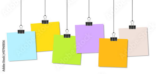 colored papers with binder clips