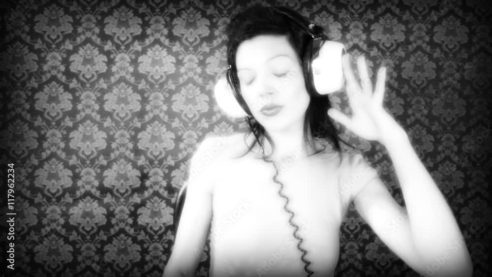 a super sexy woman dances with headphones a super sexy woman dances with headphones