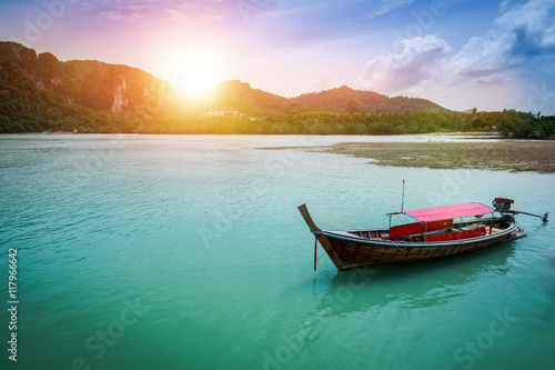 the boat on the sea with sunset light in evening at Krabi provi