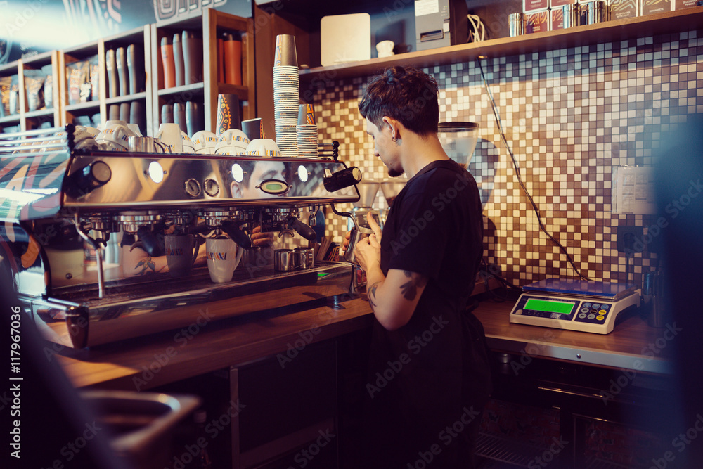 Barista at work in a coffee shop
