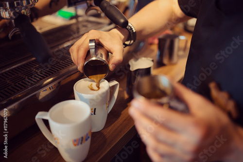 Barista at work in a coffee shop