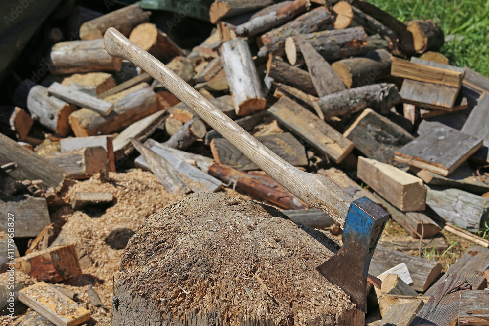 big ax of a woodcutter in the woodshed big ax of a woodcutter in the woodshed