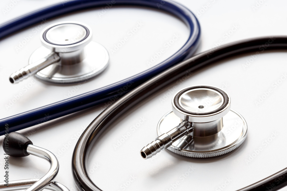 two disassembled stethoscope on white background two disassembled stethoscope on white background